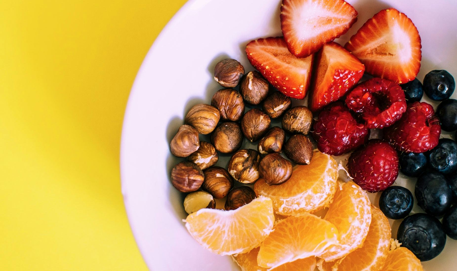 nuts, strawberries, blueberries, nuts, mandarins